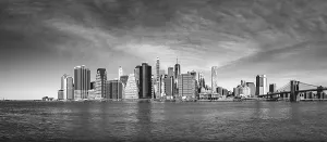 View from Pier 1 over the East River to the skyline of Lower Manhattan with Brooklyn Bridge