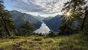 View of the Plansee lake from Schoenjoechl at sunset