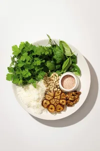 Top view of a plate with fresh ingredients for making Italian pesto gnocchi