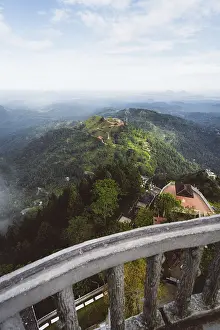 View from a platform over a hilly green landscape