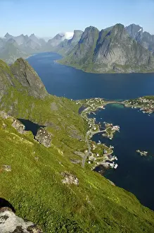 View from Reinebringen on Reine and Kjerkfjorden with rough mountains Moskenesoya Lofoten Norway