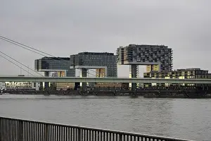 View over the Rhine with crane houses and bridge