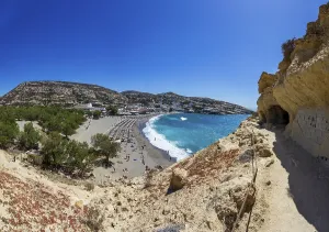View from the rock caves to the beach of Matala