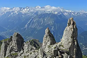 Category Mountain Landscapes Prints: View over rocky outcrops on the slopes of the Pierre Avoi summit to the mountain range of the Savoy Alps