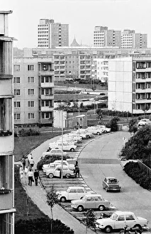 View on Roentgenstrasse with typical houses of the new district Rostock-Suedstadt