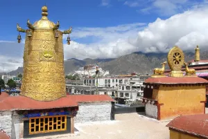 View from the roof of Jokhang Temple with golden turret to Potala Palace Lhasa Tibet China