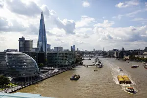 View of The Shard tower and Thames River with boats