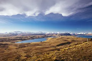 The view of the southern alps and Lake Alexandrina from Mt John Walkway
