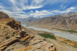 View of Spiti valley in Himalayas with stone cairn