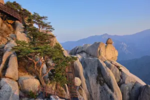 View of stones and rock formations from Ulsanbawi rock peak on sunset with staircase