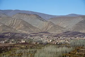 View of Taboulmante with colourful mountains in the background