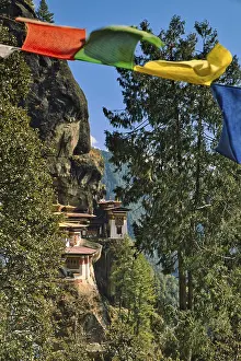 View of Taktshang Monastery through prayer flags