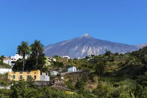 Framed Print : View of the Teide volcano from Icod de los Vinos on a sunny day with blue sky