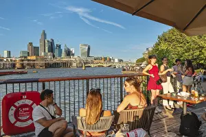 View over the Thames to the Millenium Bridge and the skyline of London