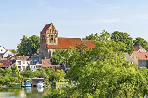 View over the town lake of Lychen to the town church of St