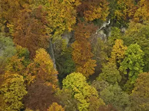 View of Urach waterfall in autumnal forest