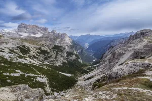 View of valleys and high mountains in the Dolomites
