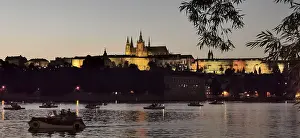 View across the Vltava towards illuminated Prague Castle