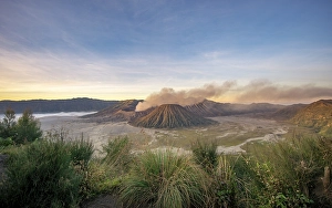 View of volcanic landscape, volcanoes at sunset