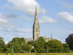 View over water meadows to Salisbury cathedral church