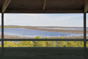 View from wooden Toivoniemi bird watching tower in spring with clouds in the sky