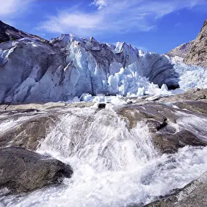 A vigourous melt-water stream issuing from the snout of the Nigardsbreen glacier