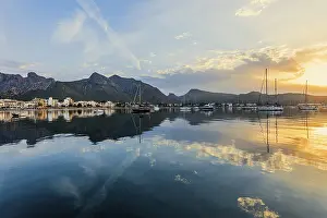 Village by the sea and mountains at sunrise