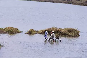 Villager crossing river Indrayani