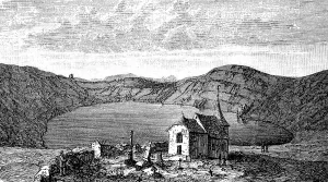 Vineyards and church at a maar in the Eifel