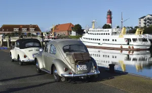 Vintage car, VW Beetle convertible at vintage car meeting at Buesum lighthouse