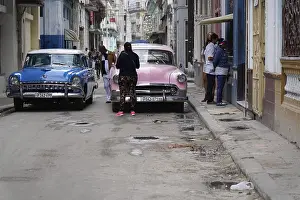 Several vintage cars from the 1950s in the centre of Havana