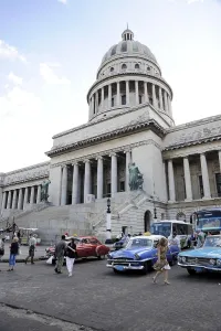 Vintage cars of the 1950's parked in front of the Capitolio Nacional building