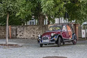 Vintage Citroen 2CV in motion, ugly duck