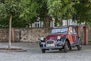Vintage Citroen 2CV in motion, ugly duck