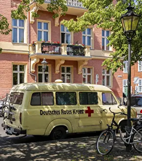 Framed Print : Vintage German Red Cross car on Bassinplatz in Potsdam