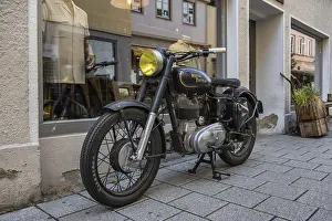 Vintage motorbike from the Indian motorbike manufacturer Royal Enfield in the old town of Ulm
