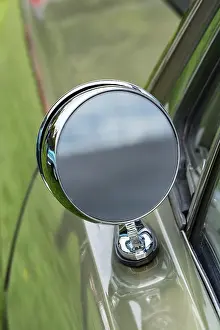Vintage outside rear mirror of an old-timer