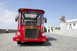 Vintage sightseeing vehicle in front of Bratislavsky Hrad