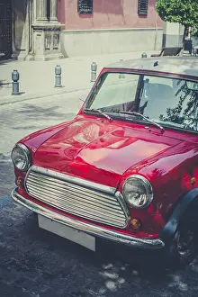 Vintage small red car on the street