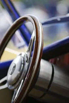 Vintage steering whell of an old timer (shallow depth of field)