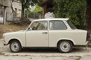 Vintage Trabant car in Eastern Europe village closeup