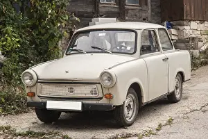 Vintage Trabant car in Eastern Europe village closeup