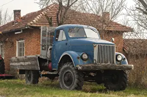 Vintage truck closeup to rural country house