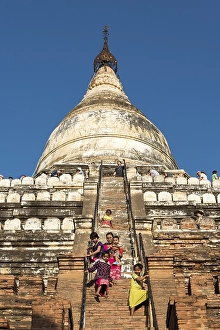 Category Buddhism Prints: Visitors climb steep steps of Shwesandaw Pagoda