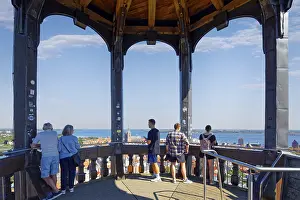 Visitors look out over the city