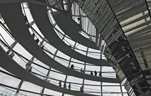 Visitors at the modern dome of the german House of Parliament Reichstag Berlin Germany