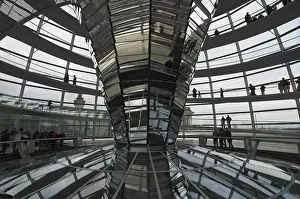 Visitors at the modern dome of the german House of Parliament Reichstag Berlin Germany