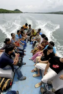 Visitors travelling in small boat