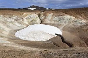 Volcanic landscape, lava field with snow field at Krafla volcano