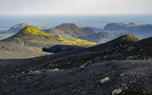 Volcanic mountain landscape overgrown with moss